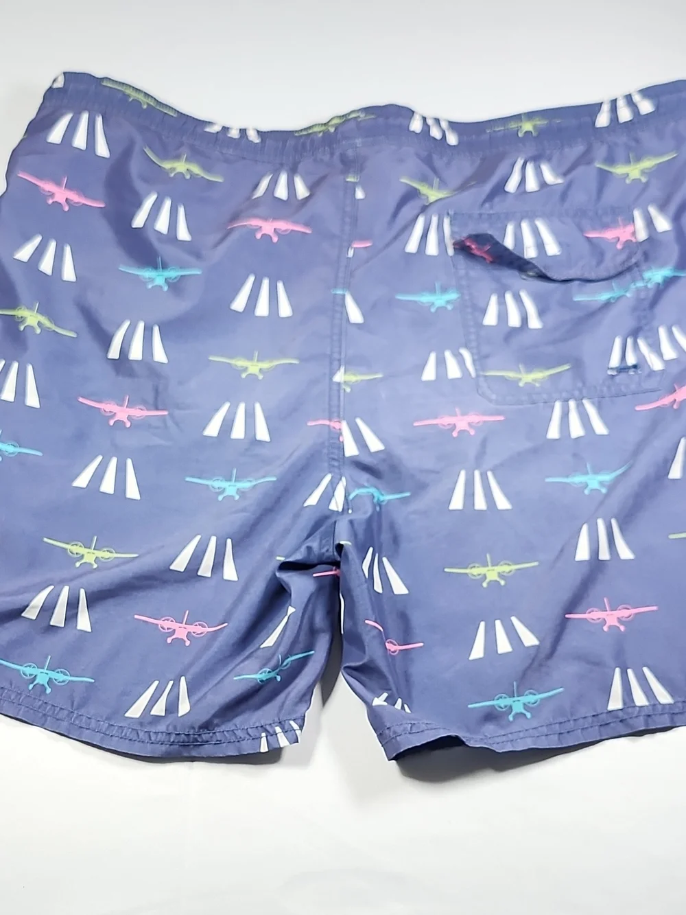 Vineyard Vines Navy Swim Trunks with Pink, Teal & Lime Plane Print